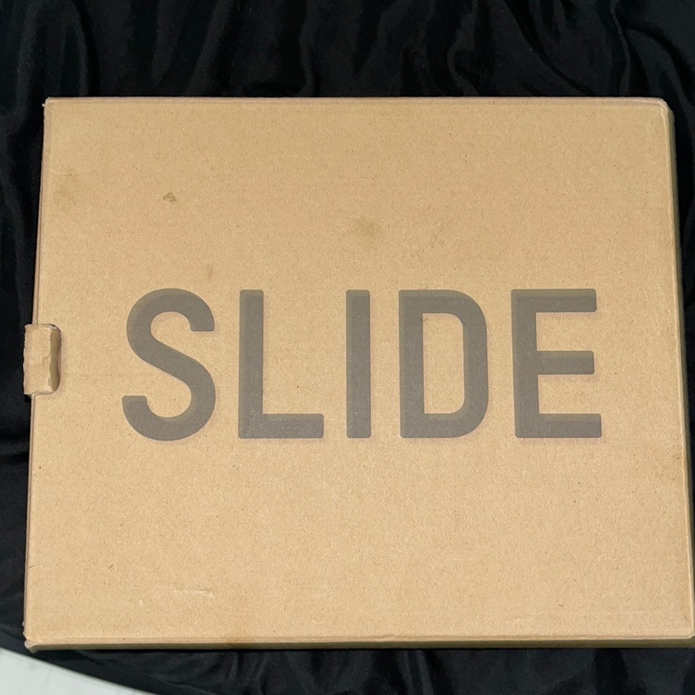 Brand new Yeezy slides. Never worn